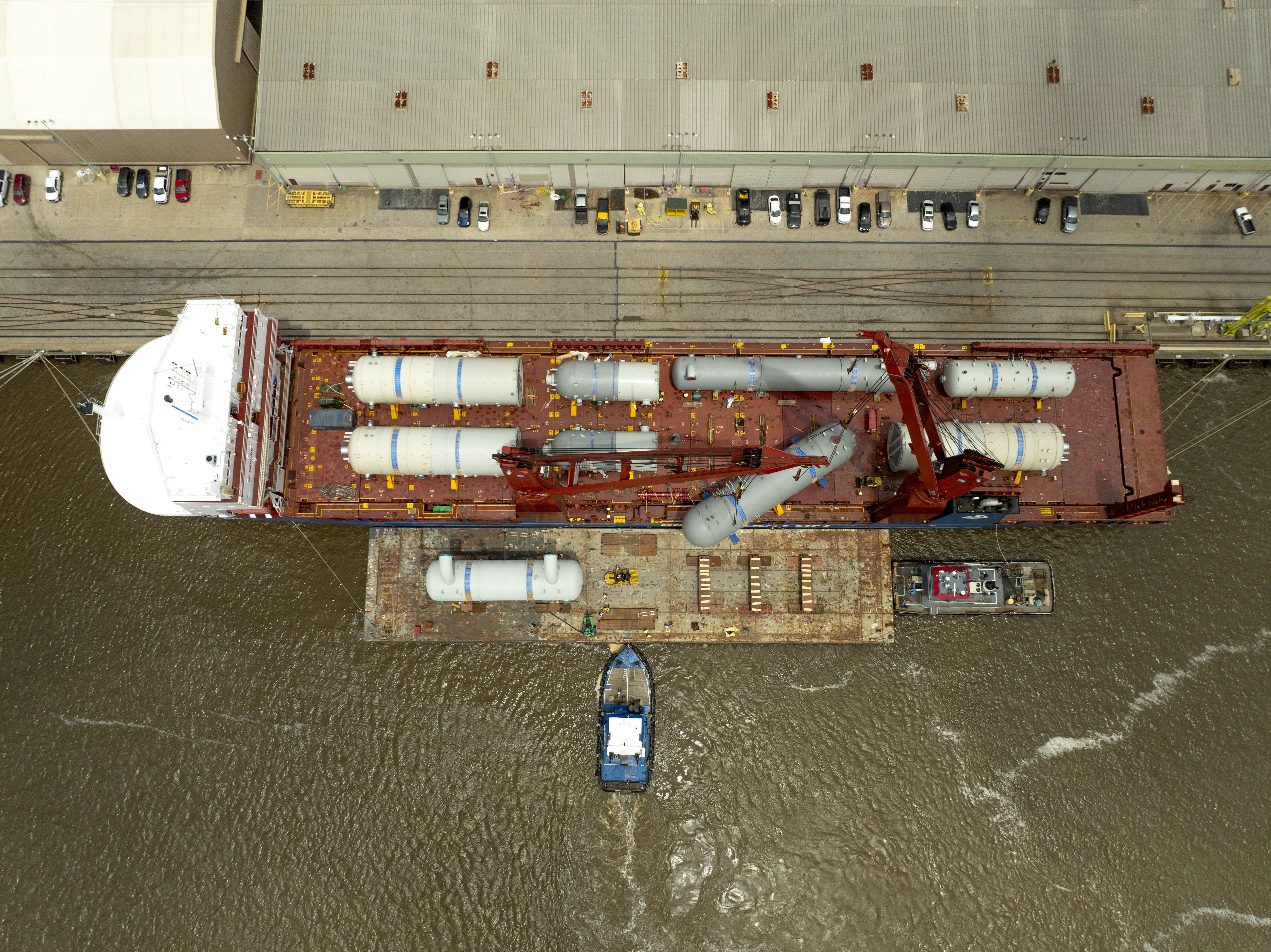 Petrochemical Project, Transloading operations from ocean vessel to barge at Port Arthur, Texas, USA