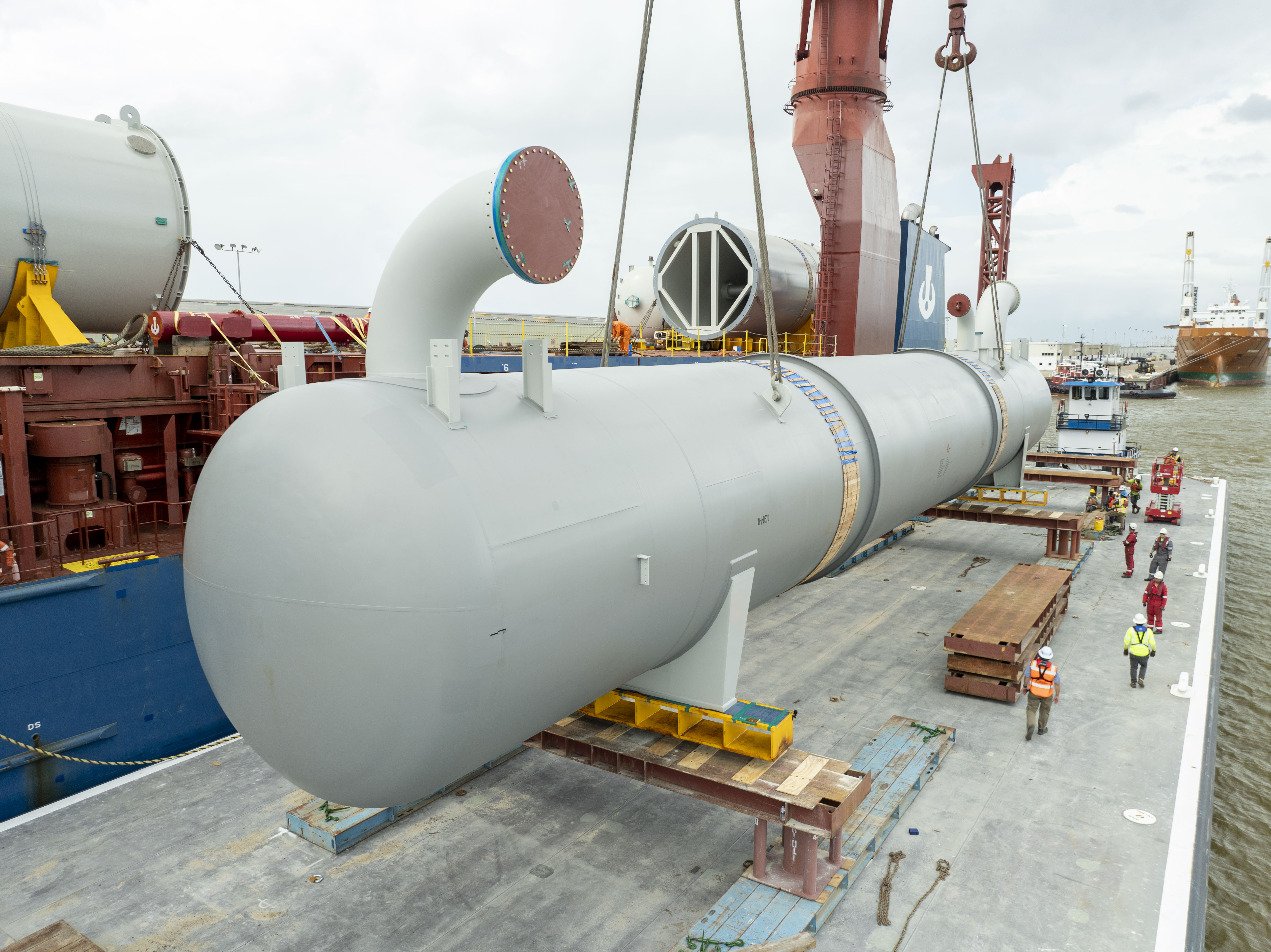 Petrochemical Project, Transloading operations from ocean vessel to barge at Port Arthur, Texas, USA