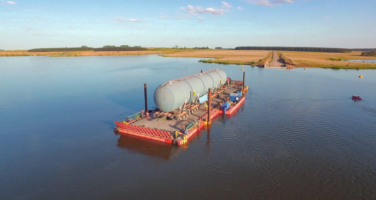 UPM Taurus Project, Crossing of a dam at Baygorria on a modular self-propelled barge exclusively designed for the project