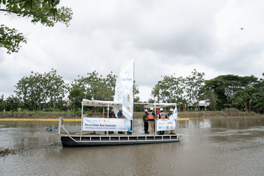 Sea Hamster 2.0 river cleaning equipment collecting floating plastic waste on the CBL River in Bekasi, Indonesia