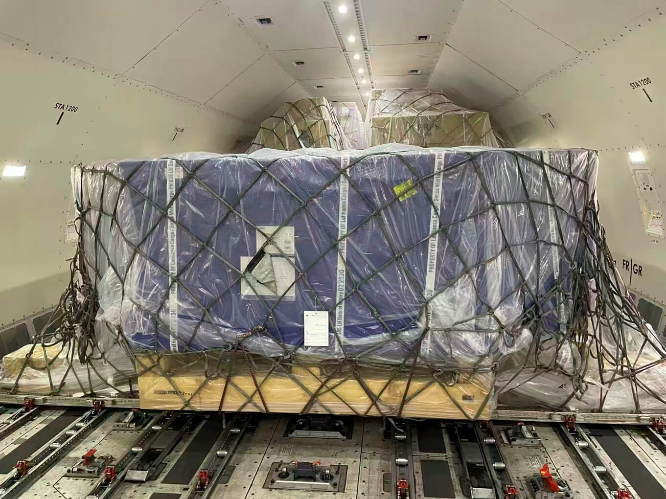 Cargo loading operations at Shanghai Pudong International Airport, China